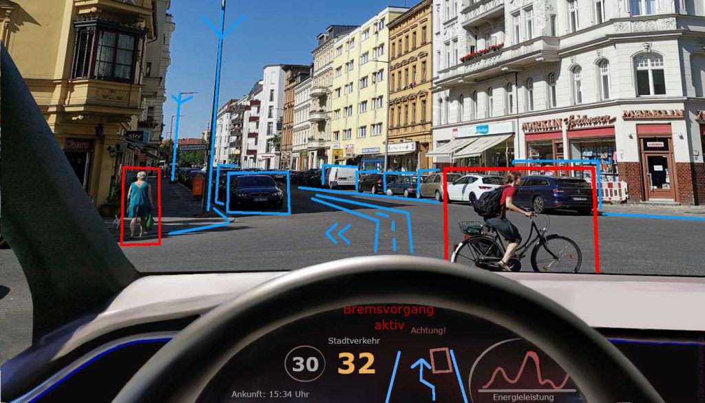 Street level image of Barcelona with buildings, pedestrians, cars, bicyclist and automobile dashboard
