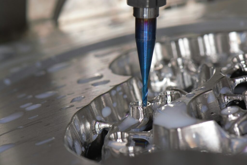 Stainless steel and blue-handled hand tools at a CAD-CAM center